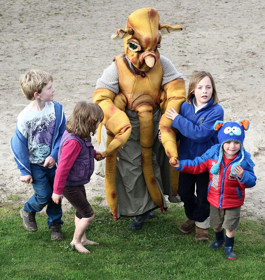 Dressed up for storytelling as Miss Octavia Murray, a costume made based on a deep-sea octopus discovered during the Challenger Expedition, with her daughter and friends